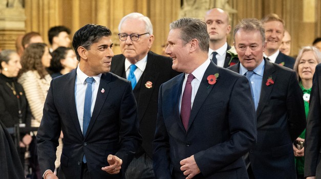 Britain's Prime Minister Rishi Sunak walks with Labour Party leader Sir Keir Starmer through the Central Lobby at the Palace of Westminster ahead of the State Opening of Parliament in the House of Lords, in London, Britain, November 7, 2023. Stefan Rousseau/Pool via REUTERS Photo: POOL/REUTERS