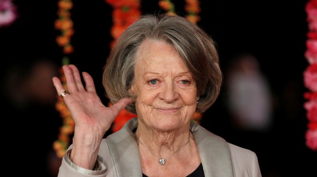 FILE PHOTO: Actress Maggie Smith arrives at the Royal Film Performance and world premiere of the film, "The Second Best Exotic Marigold Hotel", in London 
AUTOR
 Peter Nicholls 
AGENCIJA
 REUTERS 
OPIS
 FILE PHOTO: Actress Dame Maggie Smith arrives at the Royal Film Performance and world premiere of the film, "The Second Best Exotic Marigold Hotel", at Leicester Square, London, Britain February 17, 2015. REUTERS/Peter Nicholls/File Photo Photo: Peter Nicholls/REUTERS