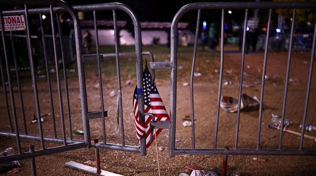 A flag is left at an event held by Democratic presidential nominee U.S. Vice President Kamala Harris during Election Night, at Howard University, in Washington, U.S., November 6, 2024. REUTERS/Daniel Cole Photo: DANIEL COLE/REUTERS