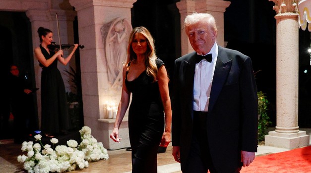 U.S. President-elect Donald Trump, accompanied by his wife Melania, attends a New Year's Eve event at Mar-a-Lago in Palm Beach, Florida, U.S., December 31, 2024. REUTERS/Marco Bello Photo: MARCO BELLO/REUTERS